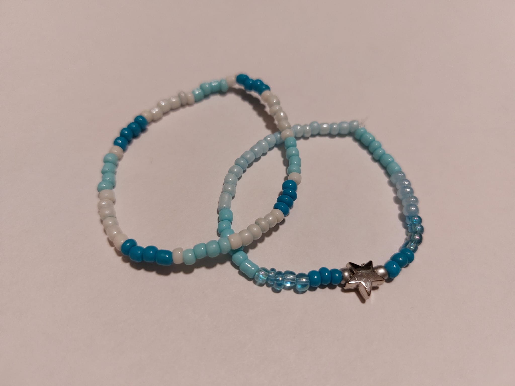 Lichte kralenketting met ster